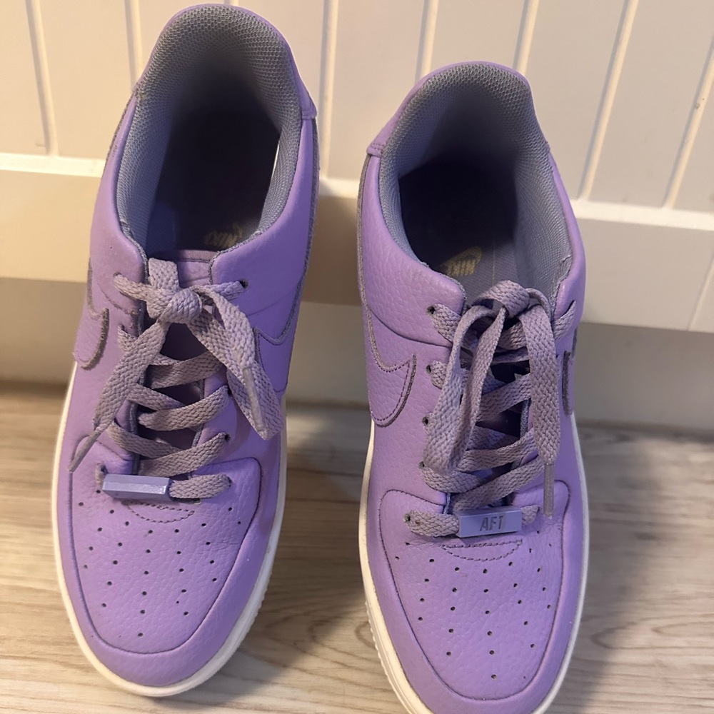 Nike Air Force light purple size 8W but feel like they fit like a 7W